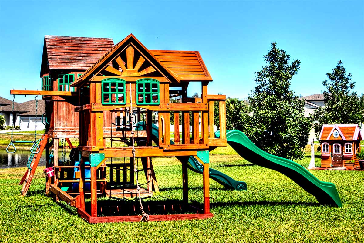 playground with playhouse and slide